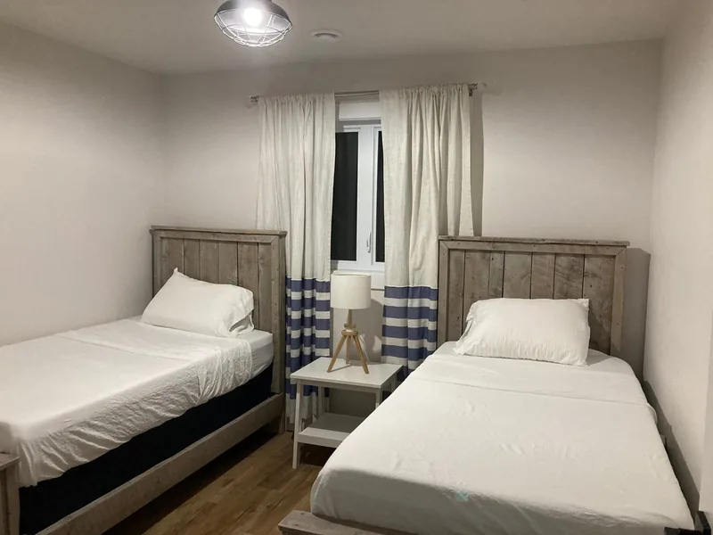 The upstairs bedroom with two single beds